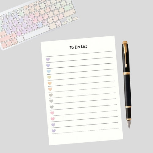 Daily planning notepad with 50 tear-off sheets for to-do lists and desk organization