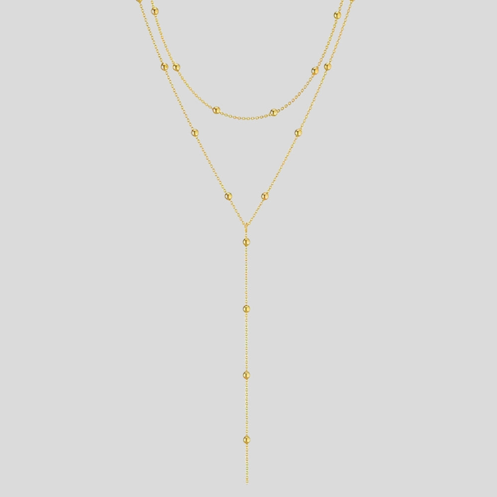 Collier long multi-rangs femme – pendentif géométrique, perles & franges, style minimaliste élégant