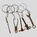 Kit outils porte-clés 5 pièces – mini tournevis, pinces, marteau & mètre ruban portable
